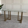 mesa de comedor oval en vidrio